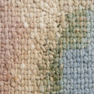 Hand-knot texture with subtle color shifts